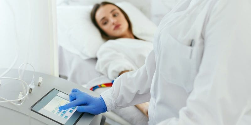 Blood Ozone Therapy. Woman At Blood Transfusion Treatment Ozone Therapy